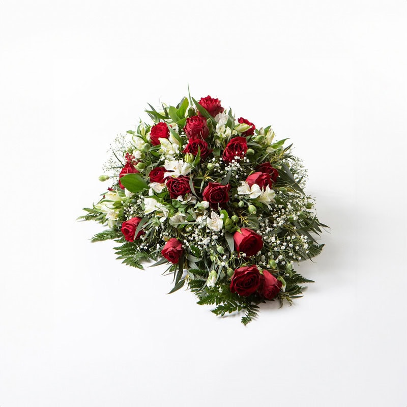 Båredekorasjon rød og hvit liten begravelse bisettelse blomster