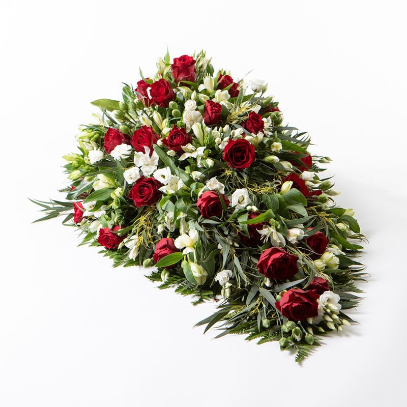 Båredekorasjon rød og hvit stor begravelse bisettelse blomster