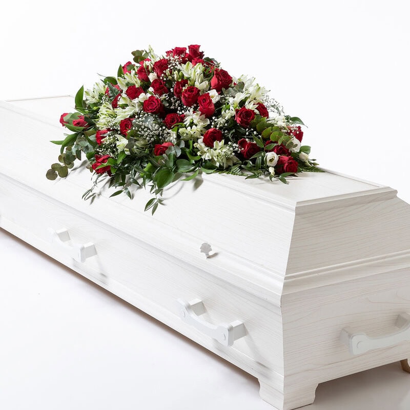 Kistedekorasjon rød og hvit liten begravelse bisettelse blomster