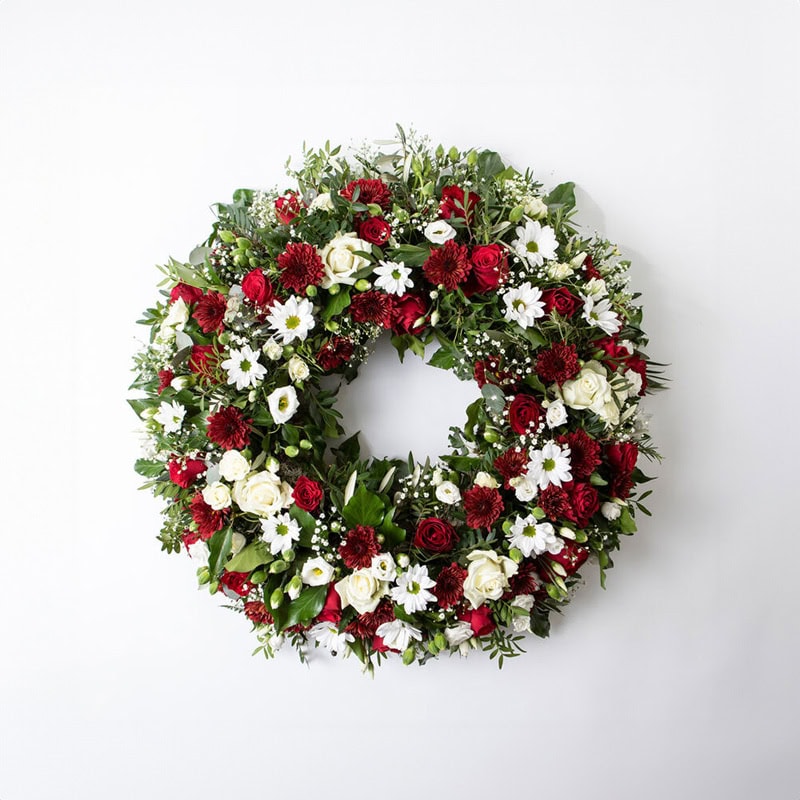 Krans rød og hvit medium begravelse bisettelse blomster