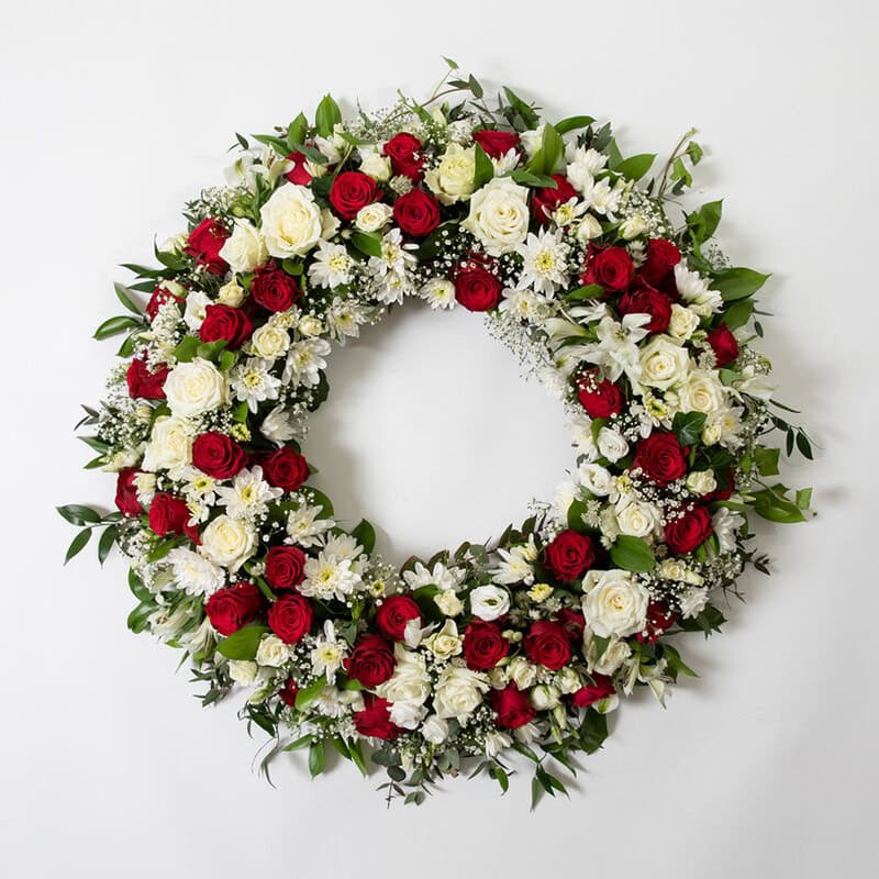 Krans rød og hvit stor begravelse bisettelse blomster